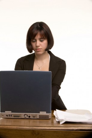 Young woman working at her computer